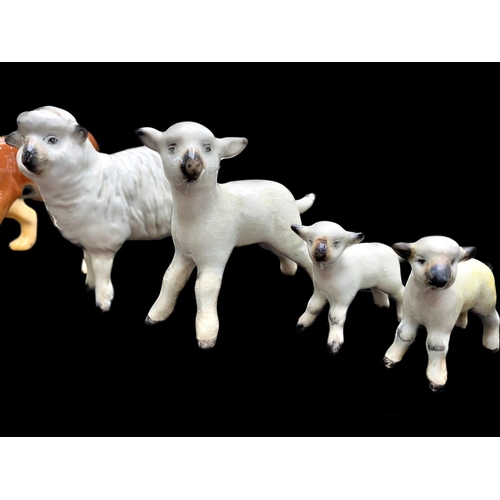 603 - A Collection of Beswick Figures including two sheep and two lamb figures, a donkey figure in brown g... 