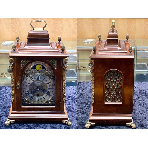 1102 - A Modern Reproduction Bracket Mantle Clock with Ormolu decoration, silvered dial, Moon face and West... 