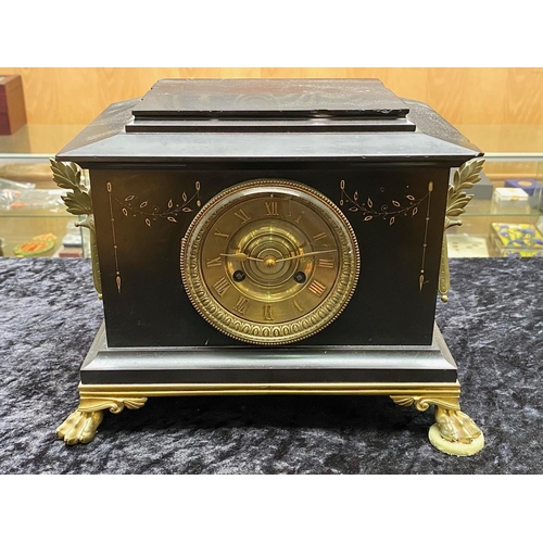 1103 - Victorian Black Marble Mantle Clock, brass dial with Arabic numerals, mounted on four claw brass fee... 