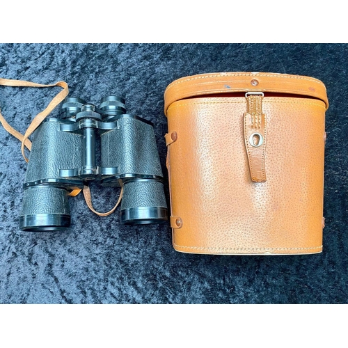 1311 - Pair of Military Field Glasses by L & G Telstar, in a tan leather carry case.