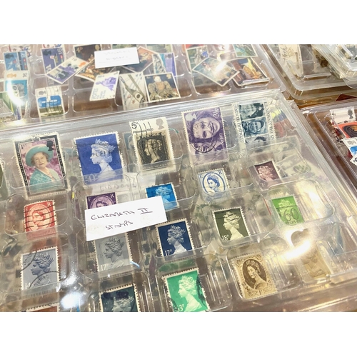 1414 - Stamp Interest - Three Boxes of QEII Stamps, displayed by set in clear plastic containers.