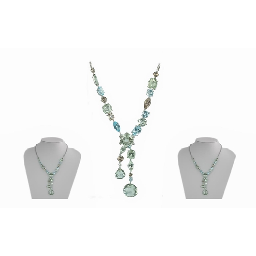 25 - Ladies 18ct White Gold Superb Multi-Stone Set Necklace, set with pale blue aquamarines, faceted topa... 