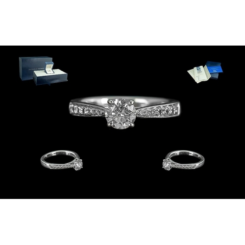 30 - Ladies Superior Quality Platinum Diamond Set Dress Ring. The Central Round Brilliant Cut Diamond of ... 