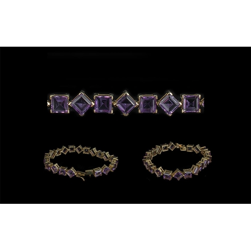 30A - Ladies Attractive 9ct Gold Amethyst Set Bracelet - marked 9.375. The well matched amethyst of excell... 