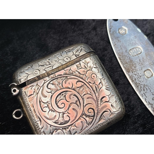 385 - A Collection of Silver Items all hallmarked for silver. To include silver key ring, paper knife, ves... 