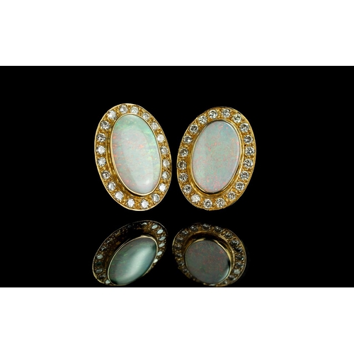 38A - 18ct Gold Superb Quality and Impressive Pair of Opal and Diamond Set Earrings. Marked 18ct - 750. Th... 