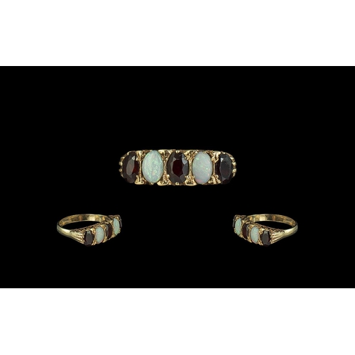 47A - Ladies Attractive 9ct Gold Opal and Garnet Set Ring, In Ornate / Design Setting. Full Hallmark to Sh... 