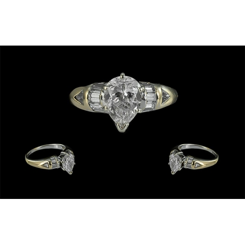 5 - Ladies 18ct White Gold Diamond Set Ring Set with a Single Pear Shaped Diamond at the Centre of Appro... 