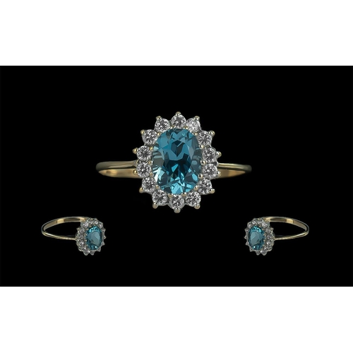 69A - Ladies Attractive 9ct Gold Aquamarine and Diamond Set Cluster Ring. Full Hallmark to Interior of Sha... 