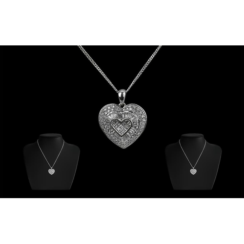 83 - 14ct White Gold Attractive Diamond Set Heart Shaped Pendant with Attached 9ct Gold Marked Chain. Pen... 