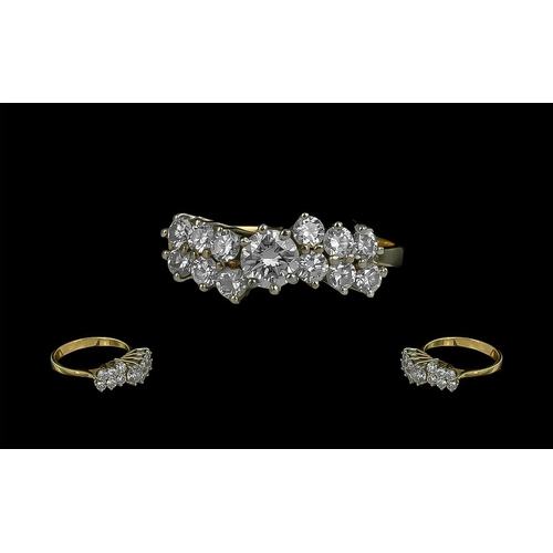 84 - 18ct Gold - Attractive Diamond Set Dress Ring. Marked 750 to Shank. The Round Brilliant Cut Diamonds... 