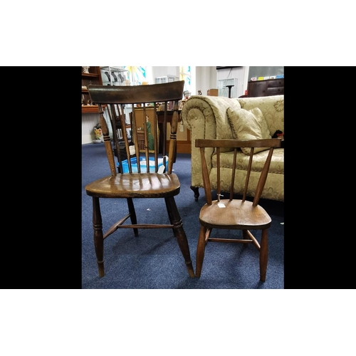 1025 - Antique Victorian Windsor Armchair, stick back, turned legs and decoration.  Measures 33'' high x 17... 