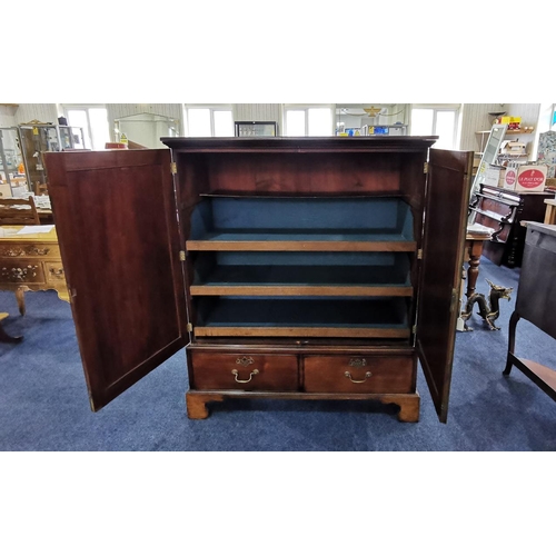 1042 - Georgian Mahogany Linen Press, shelves behind doors over two drawers.  Brass handles, raised on four... 