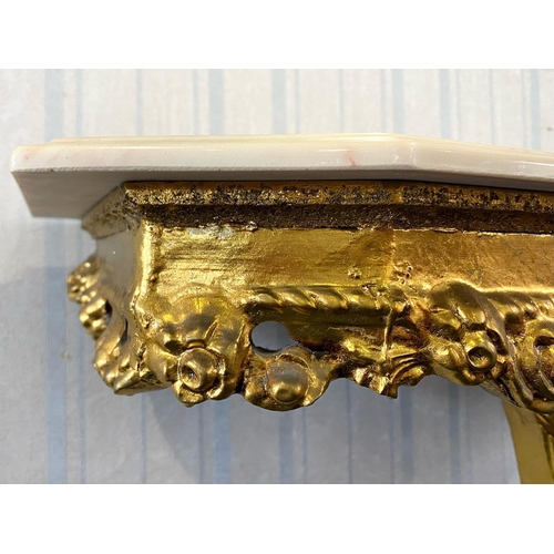 1058 - An Italian Style Gilt Cherub Console Table, modern marble style top.  Height 31'' x width 32'' x 11'... 