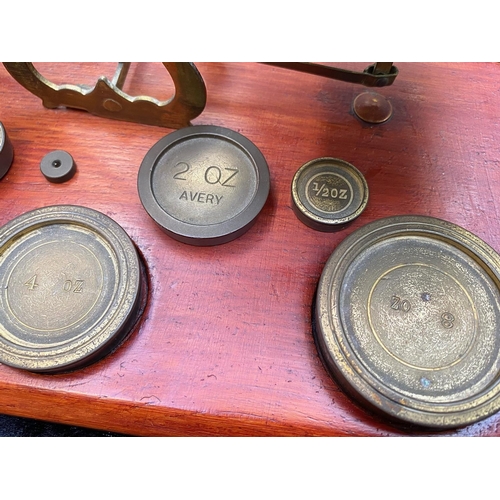 1246 - Set of Postal Scales, mounted on wooden base, with weights.