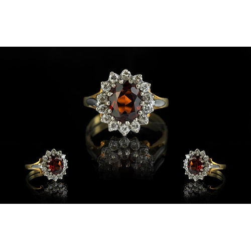 136 - Ladies 18ct Gold Attractive Diamond & Fire Garnet Cluster Ring, flowerhead setting.  Diamonds and Ga... 