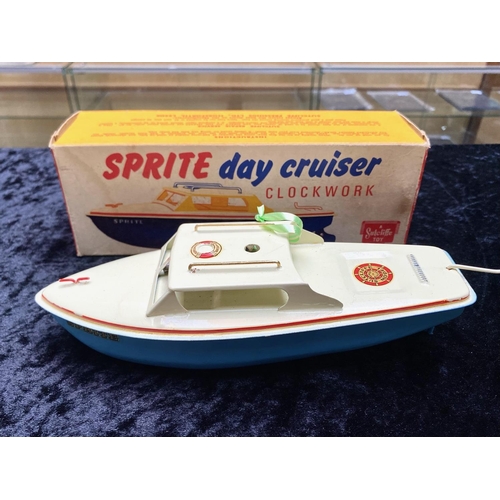 1491 - Two Vintage Boxed Speedboats, comprising a Sprite Day Cruiser Clockwork Boat by Sutcliffe, original ... 