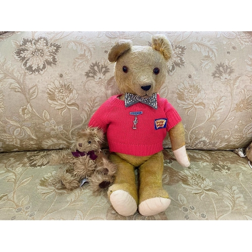 1511 - Vintage Busy Bear Teddy, moveable limbs, wearing a red sweater and bow tie.  Measures 20'' high.  To... 