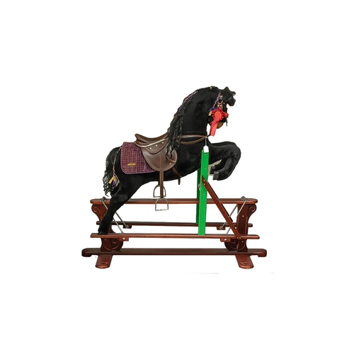 1585 - Beautiful Child's Rocking Horse, on wooden rockers, with brown leather saddle and bridle, with a pur... 