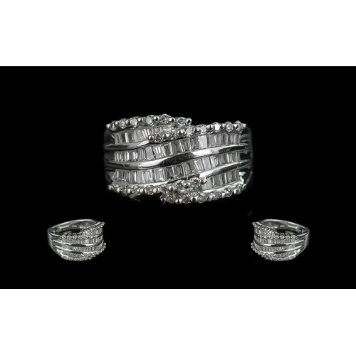 33 - 14ct White Gold - Good Quality Baguette and Brilliant Cut Diamond Set Dress Ring. Marked 14ct - 585 ... 