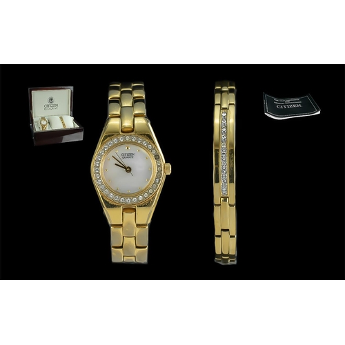 421 - Ladies Eco Drive Quartz Watch and Bracelet Set The timepiece features a silver dial and a cubic Zirc... 