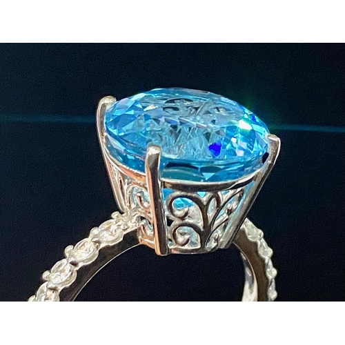 434 - Swiss Blue Topaz Statement Ring, a 12.5ct round cut solitaire topaz of the rich, bright shade known ... 