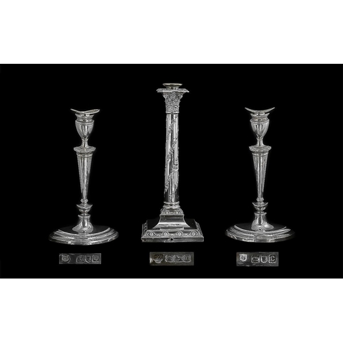 465 - A Pair of Silver Candlesticks, hallmarked for London C 1898.  Plain form on stepped oval base, heigh... 