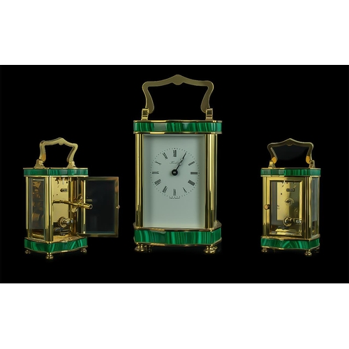 466 - An English Henley Carriage Clock, with a Malacite trim and brass case.  Working at the time of catal... 