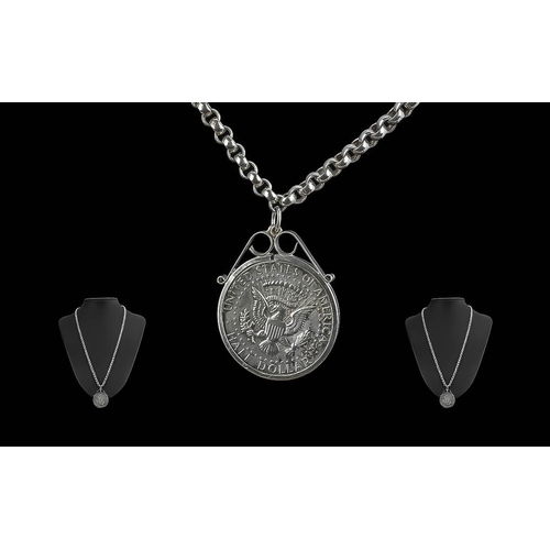 467 - 1964 Half Dollar set in pendant with silver mount, set on a 22'' belcher chain.