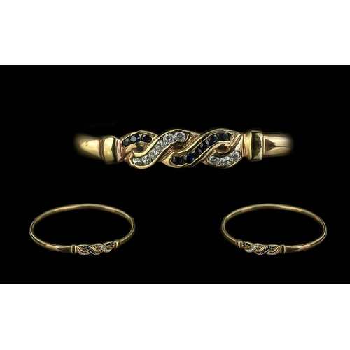 471 - 9ct Gold Hinged Bracelet, the front set with faceted round stones, fully hallmarked.  Weight 7.8 gra... 