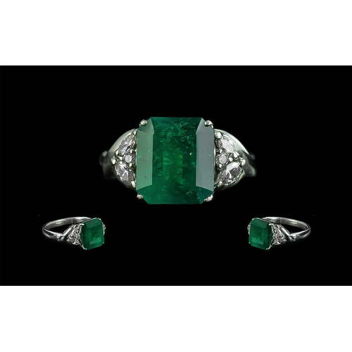 52 - Platinum Superb Emerald and Diamond Set Dress Ring, marked platinum 900 to shank, the square shaped,... 