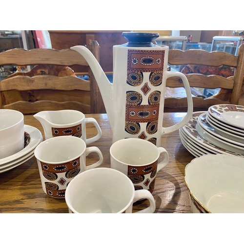 695 - Studio Coffee Set, comprising coffee pot, cream jug, sugar bowl, four coffee cups , together with  a... 