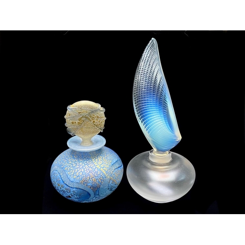 767 - Two Glass Perfume Bottles, a Lalique frosted perfume bottle with a long feather style stopper, marke... 