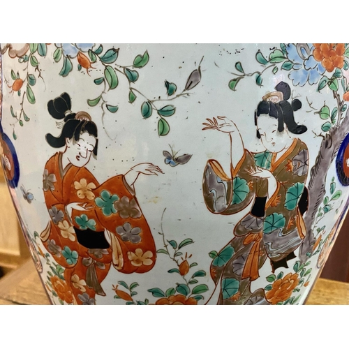 826 - A Large Japanese Imari Temple Vase the panels depicting dancing girls amongst foliage and stylised b... 