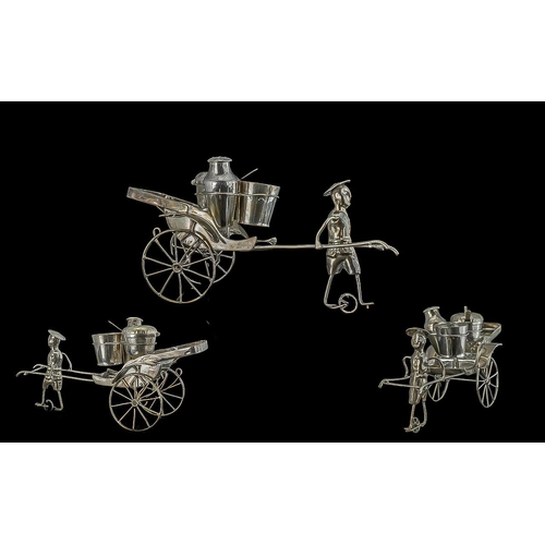 861 - Oriental Cruet Set, novelty in the form of a man pulling a rickshaw, with salt, pepper and mustard p... 