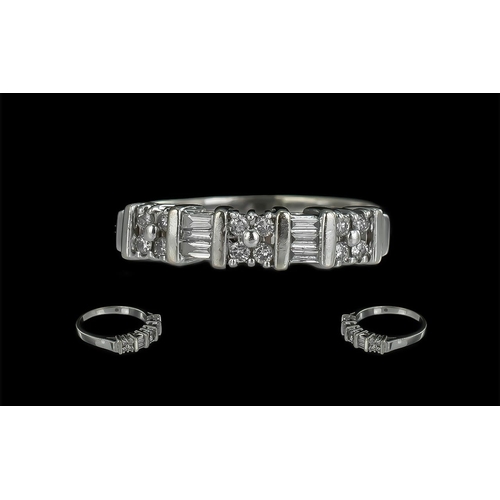 90A - 14ct White Gold Pleasing Quality Baguette and Brilliant Cut Diamonds Channel Set Ring. Marked 14ct t... 