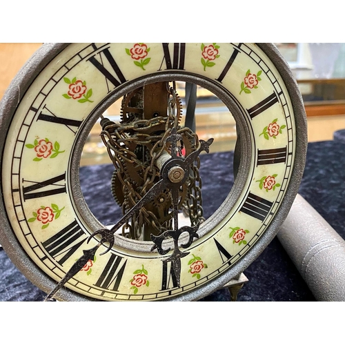 1152 - German Wall Clock, Roman numerals on ceramic rim decorated with flowers.