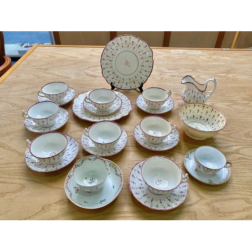 651 - Lustre Tea Set Circa 1840, comprising milk jug, sugar bowl, eight cups, seven saucers, and two bread... 