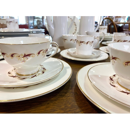 699 - Bone China 'Argyle' Tea/Coffee Set, comprising two coffee/tea pots, six tea cups and saucers, six co... 