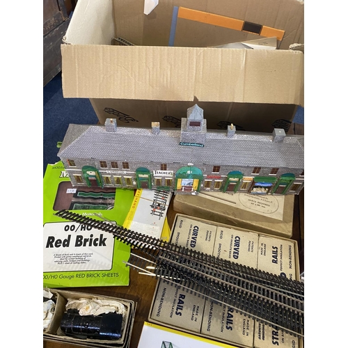 1474 - Two Large Boxes Containing a Quantity of Model Railway Station Kits, mostly built, together with tra... 