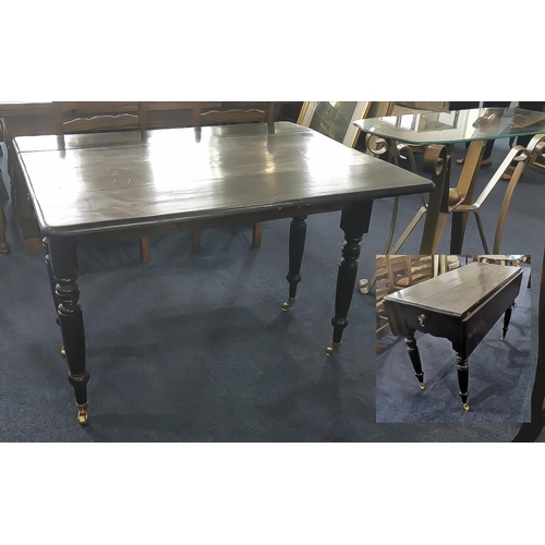 1054 - A Painted Pine Pembroke Table of typical form, firm supports, and brass casters. Height 30 inches, 4... 