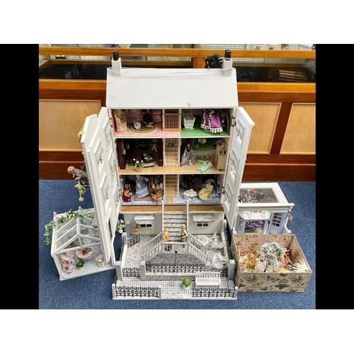 1057 - A Four Storey Mansion Dolls House, Painted In White with Lights. With Black Painted Front Door on an... 