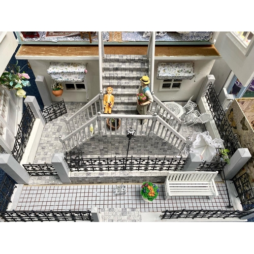 1057 - A Four Storey Mansion Dolls House, Painted In White with Lights. With Black Painted Front Door on an... 