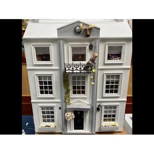 1057 - A Four Storey Mansion Dolls House, Painted In White with Lights. With Black Painted Front Door on an... 