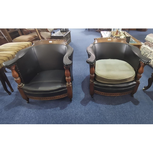 1059 - A Paid of Early 20th Century Mahogany Framed Tub Chairs carved back rest, leatherette covering with ... 