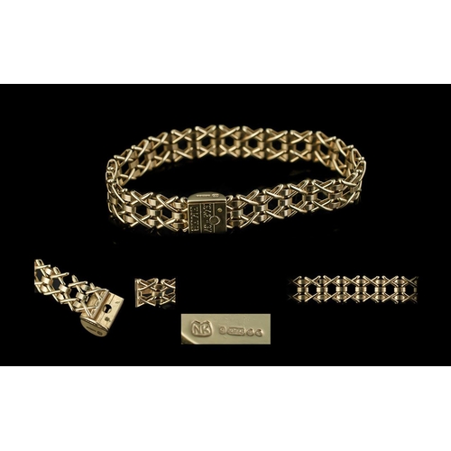 107 - Ladies Attractive and Well Made 9ct Gold Kisses x Bracelet. Fully Hallmarked. Hallmark London 1927. ... 