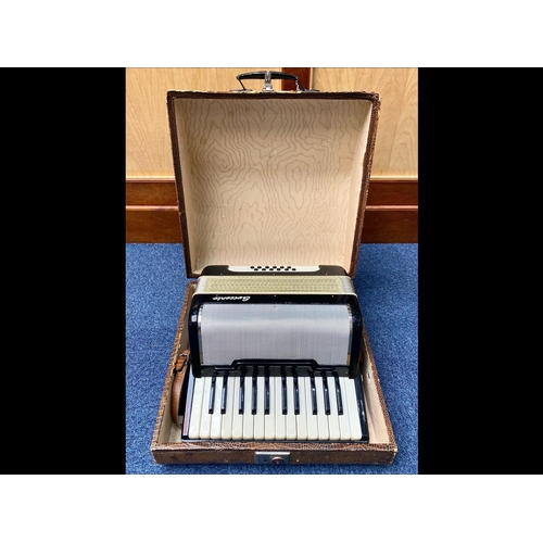 1131 - Sorrento Accordion, German made, in fitted case with handle.