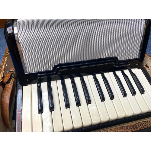 1131 - Sorrento Accordion, German made, in fitted case with handle.