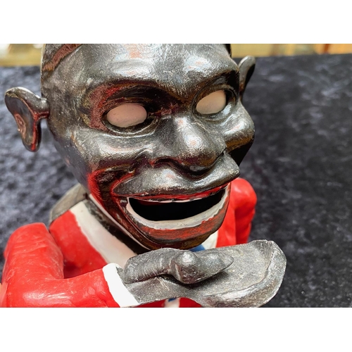 1234 - Jolly Boy Mechanical Metal Savings Bank, extended hand taking the coin into his mouth.  Measures app... 