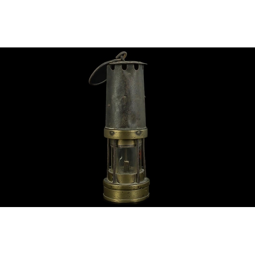 1235 - Traditional Brass Miner's Lamp, measures 10'' high, with hanging hook.